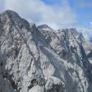 Razgled z vrha na Skuto, Grintovec in Jezersko Kočno (od leve proti desni)