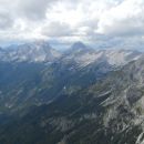 Razgled s sedla Planja na Jalovec (levo) in Mangart (desno)
