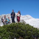 Na poraščeni Evi, zadaj Mišel in Triglav.