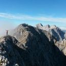 Razgled iz vrha na Grintovec, Kočno, Skuto, Rinke, Tursko goro in Veliko Babo