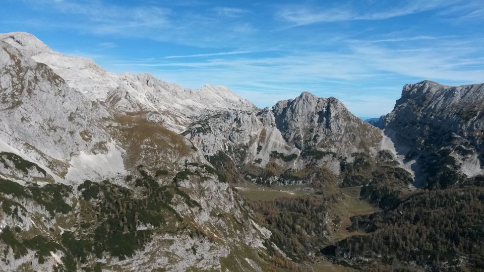 Razgled iz vrha na Triglav, Rž, Rjavino, Vernar in Tosc (od leve proti desni)