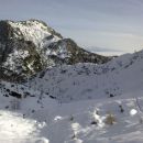 Razgled iz poti nazaj na Viševnik (levo) in Kamniško-Savinjske alpe (desno v daljavi)