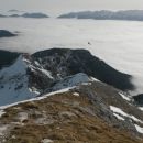 Razgled iz vrha na Ablanco (v ospredju) in Bohinjske gore (v ozadju)