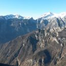 Razgled z vrha na Kalški greben in goro, Grintovec, Skuto in Brano (od leve proti desni)