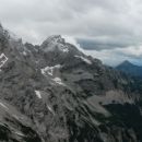 Razgled z vrha na Grintovec, Jezersko Kočno in Storžič (od leve proti desni)