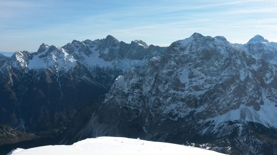 Razgled iz vrha na Martuljške gore, Škrlatico, Dolkovo špico, Prisojnik in Triglav