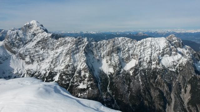 Razgled iz vrha na Mangart, Vevnico, Strug in celoten greben Ponc