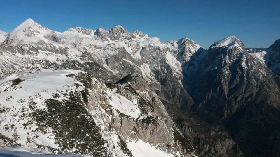 Razgled iz vrha na Grintovec, Skuto, Rinke, Tursko goro, Brano in Kamniško sedlo