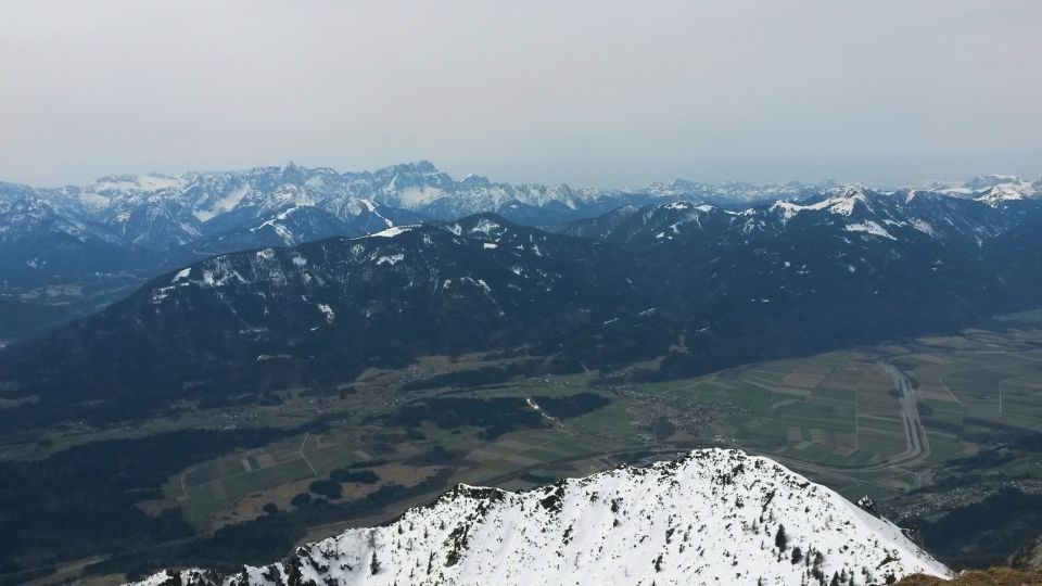 Razgled z vzhodnega vrha Dobrača na zahodne Julijske Alpe in Karnijske Alpe