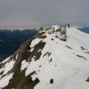 Razgled z vzhodnega vrha Dobrača na zahodni vrh Dobrača in Avstrijske Alpe
