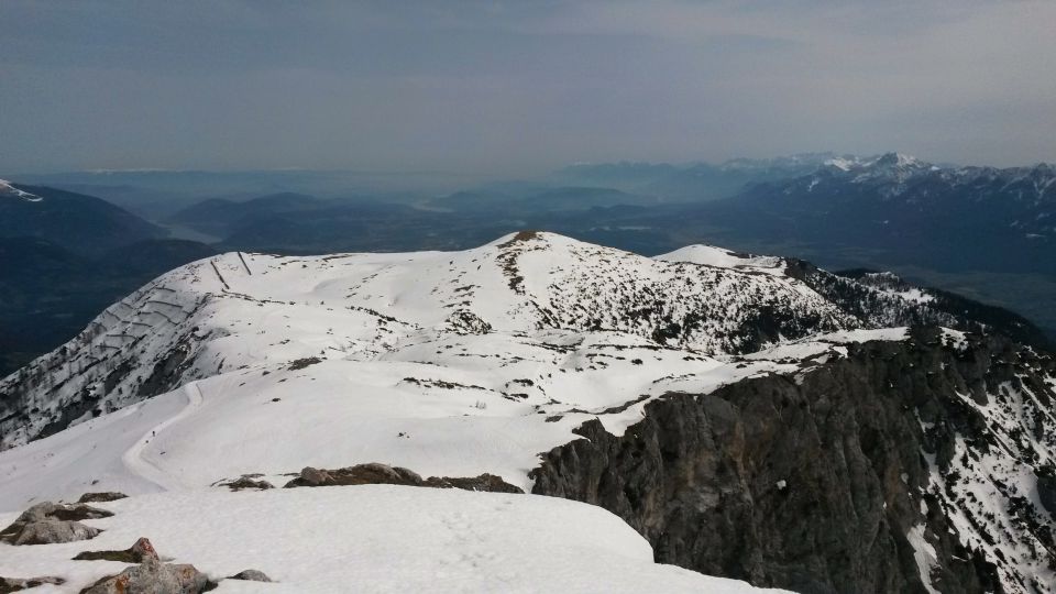 Razgled z vzhodnega vrha Dobrača na pobočje Dobrača