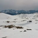 Spust z Dobrača ter razgled na pobočje Dobrača in Julijske Alpe