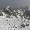 Razgled z vrha Grintovca na Skuto, Tursko goro, Ojstrico, Planjavo in Brano