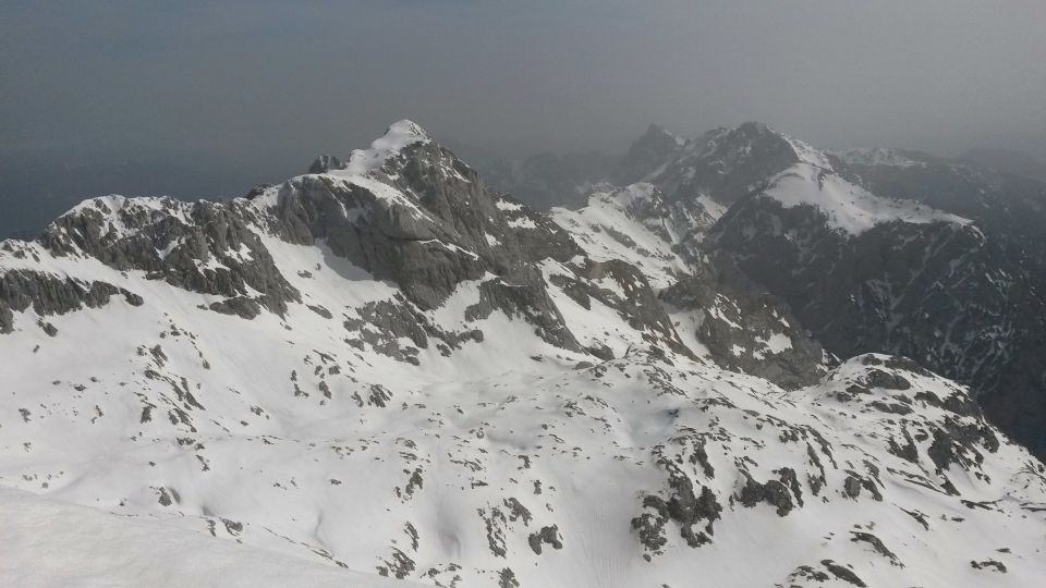 Razgled z vrha Grintovca na Skuto, Tursko goro, Ojstrico, Planjavo in Brano