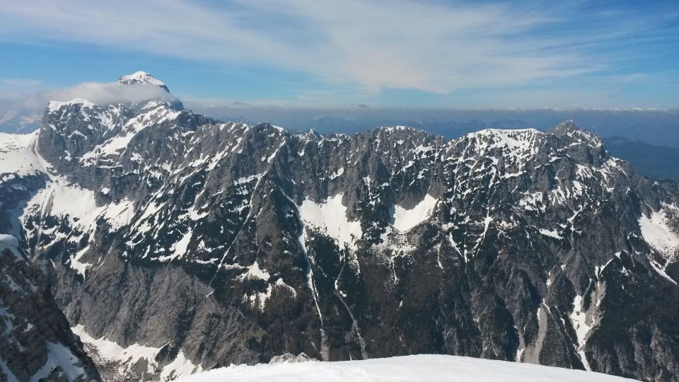 Razgled z vrha Male Mojstrovke na Mangart, Vevnico, Strug in celoten greben Ponc