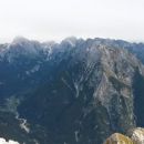 Razgled z vrha Rombona na Mangart, Jalovec in Loško steno (od leve proti desni)