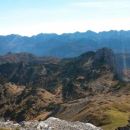 Razgled z vrha Kopice na Tičarici (v ospredju) ter Bohinjske hribe (v ozadju)