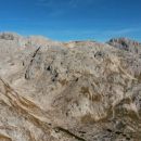 Razgled z vrha Kopice na Kanjavec, Vogle in Debeli vrh (od leve proti desni)