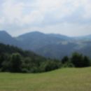 Zamegljen pogled na predel od Lubnika do Praprotna.